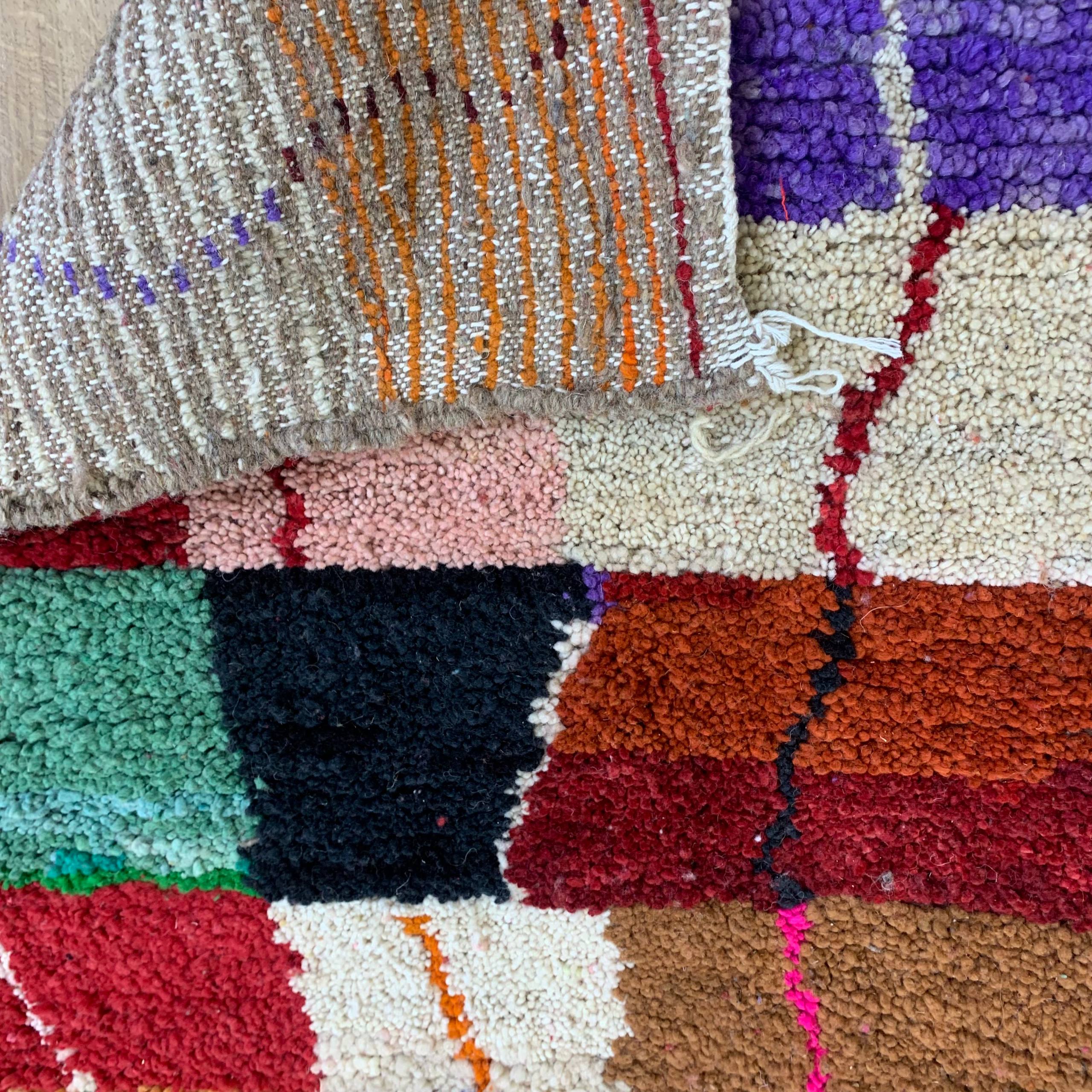 Handwoven Multicolor Patchwork Wool Rug with Textured Pile