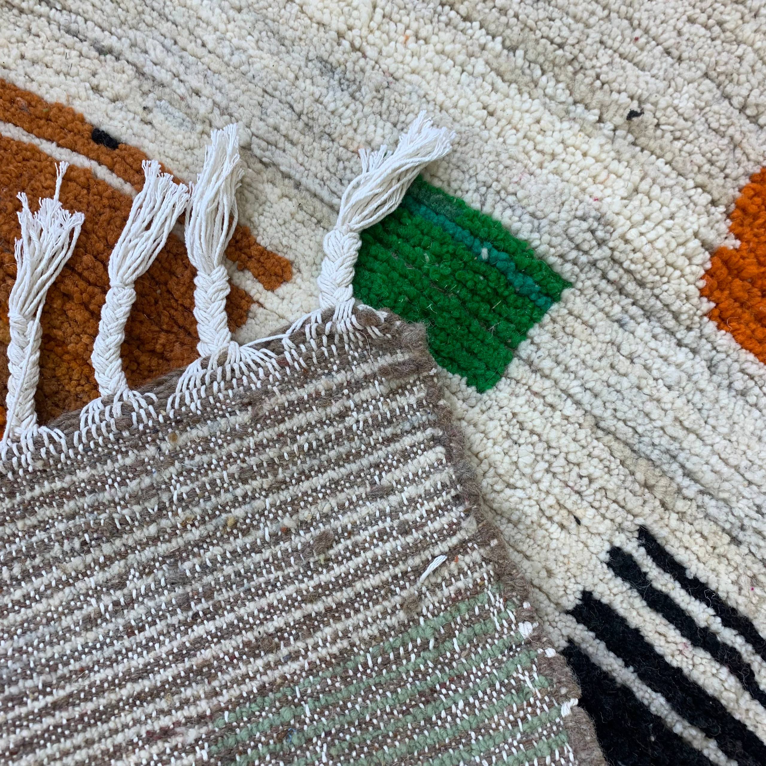 Handwoven Textured Wool Rug with Geometric Blocks and Tassel Fringe